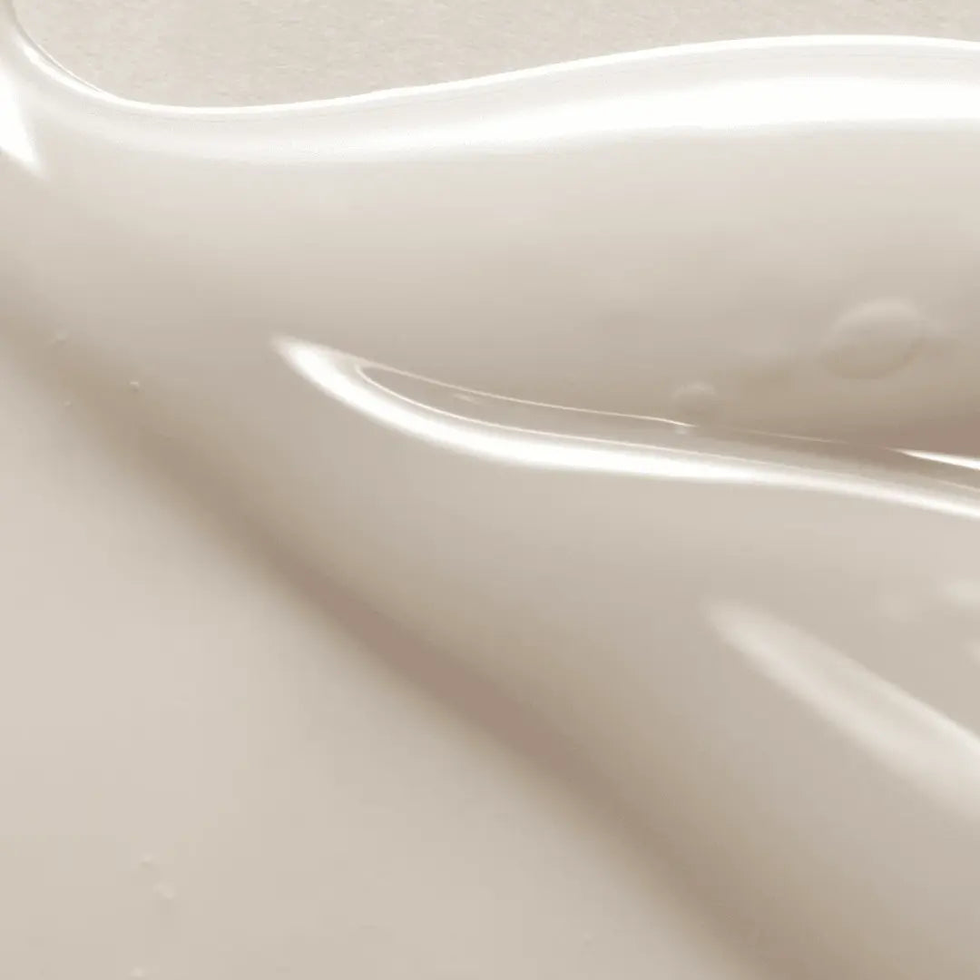 Applying AXIS-Y Dark Spot Correcting Glow Serum to skin for radiant and even complexion