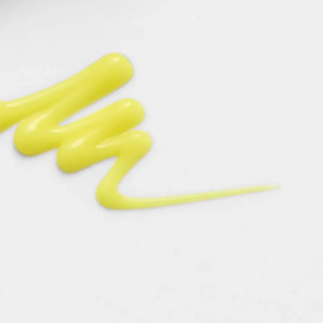 Applying Celimax Retinal Shot Tightening Booster to face – firming and brightening skincare step