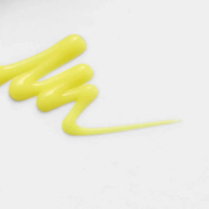 Applying Celimax Retinal Shot Tightening Booster to face – firming and brightening skincare step