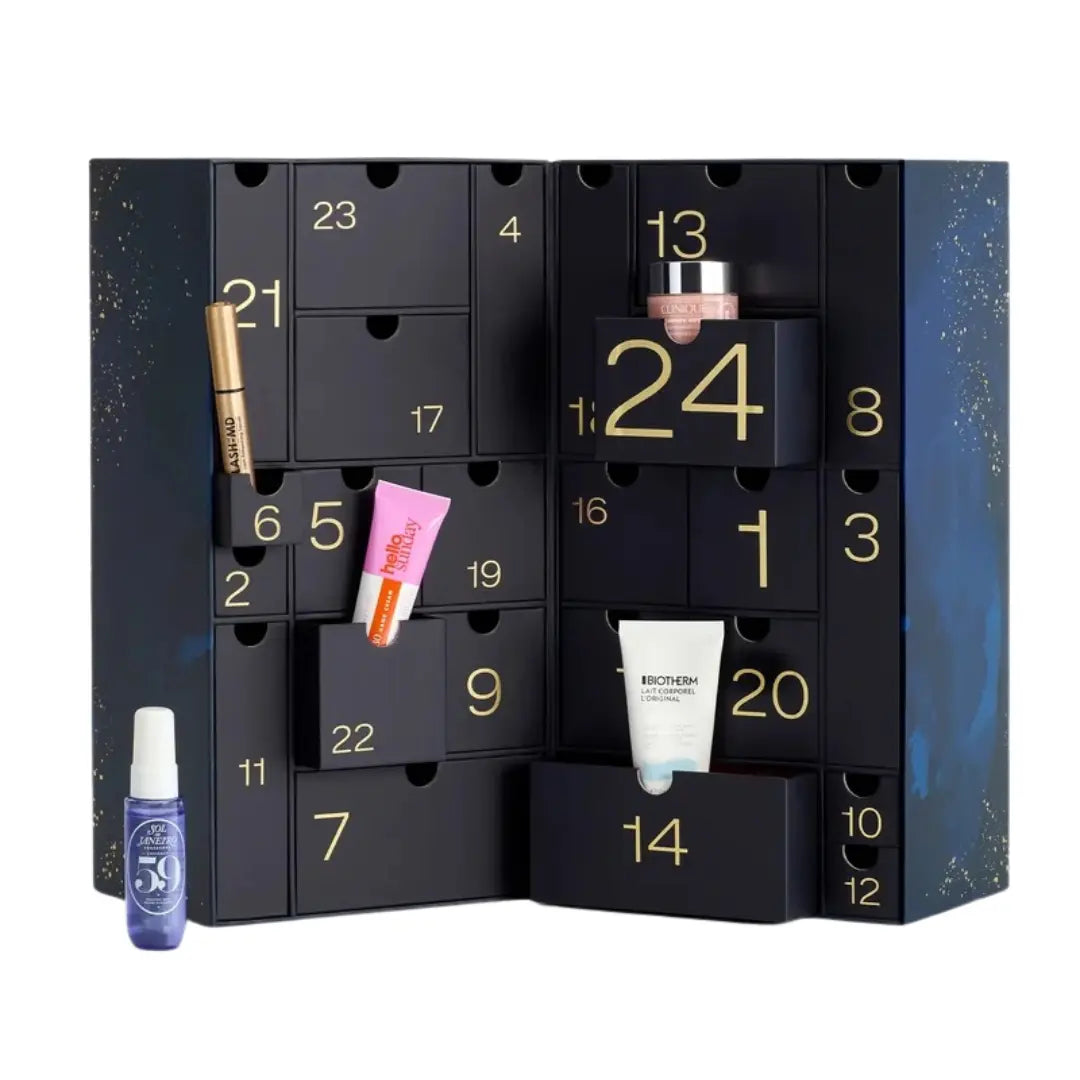 Woman opening the Skinkura Advent Calendar 2025 surrounded by luxury beauty gifts and festive decor